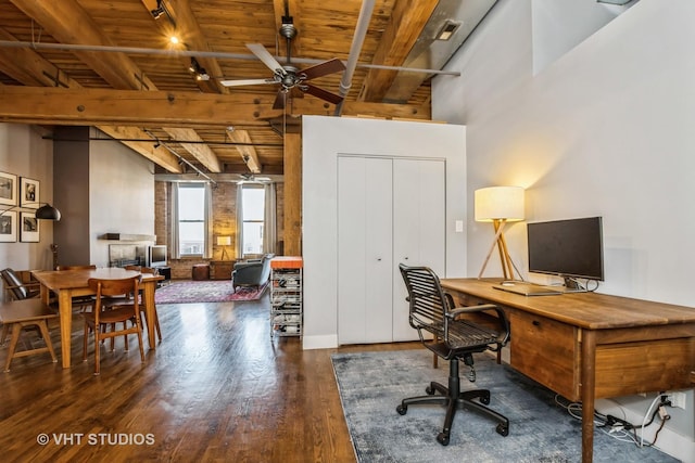 office area featuring track lighting, ceiling fan, beamed ceiling, dark hardwood / wood-style flooring, and wood ceiling