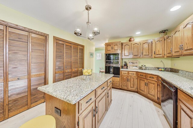 dining space with light hardwood / wood-style floors