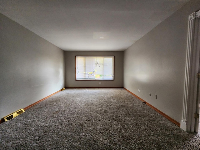 spare room featuring carpet flooring