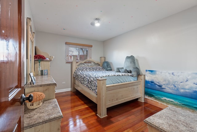 bedroom featuring dark wood-type flooring