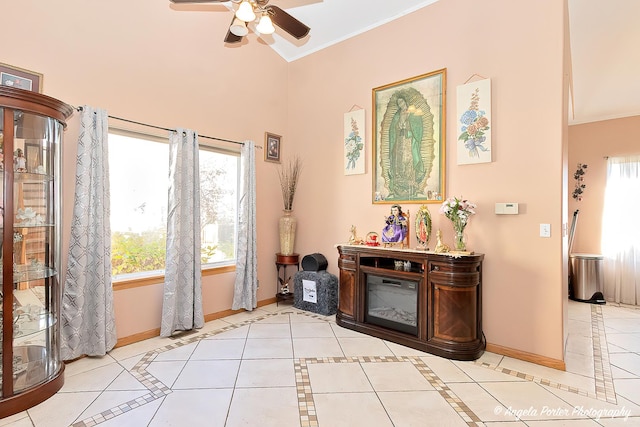 interior space featuring ceiling fan and light tile patterned floors