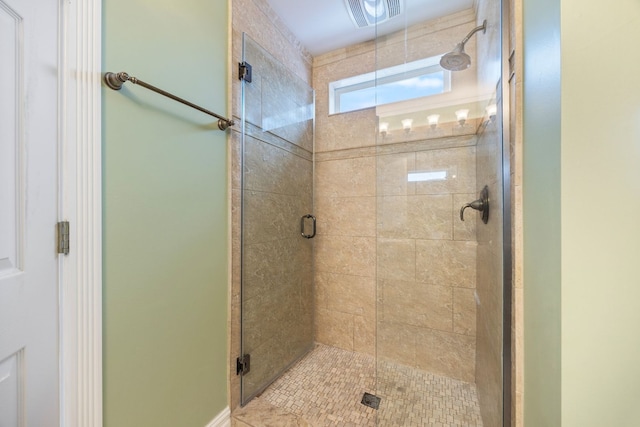 bathroom with an enclosed shower