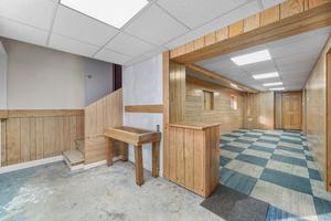 basement featuring a drop ceiling