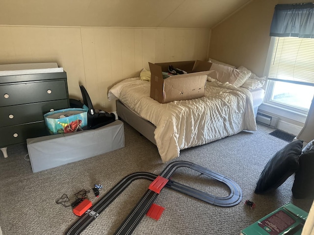 bedroom with lofted ceiling and carpet