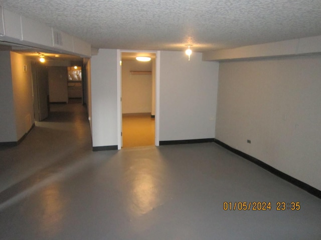 basement with a textured ceiling