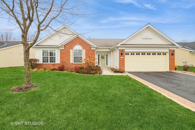 view of front of home featuring a garage and a front yard