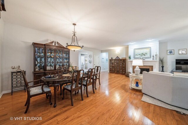 dining space featuring light hardwood / wood-style floors