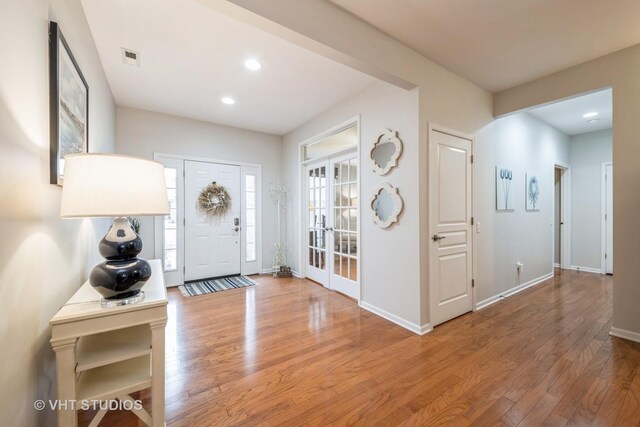 foyer with hardwood / wood-style floors