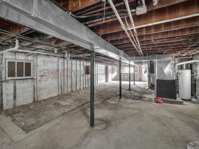 basement with heating unit and gas water heater