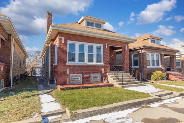 view of front of home featuring a front yard