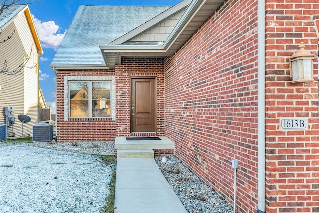 entrance to property featuring central AC