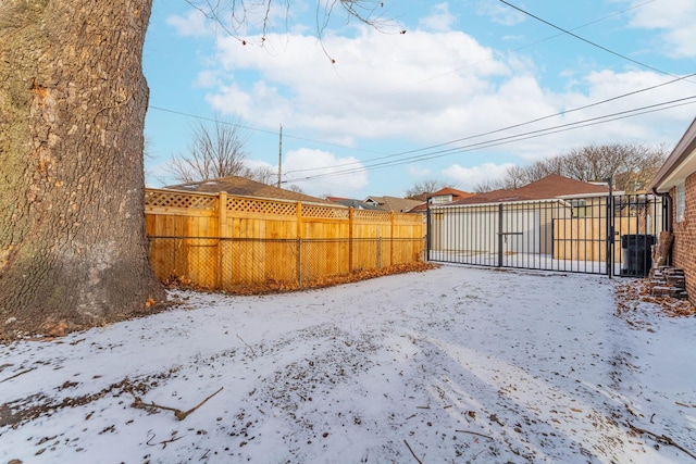 view of yard covered in snow