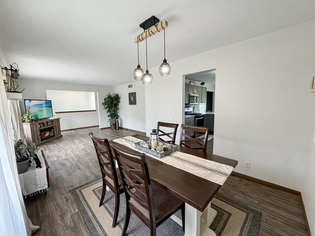 dining room featuring dark hardwood / wood-style floors