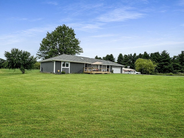 view of yard featuring a wooden deck