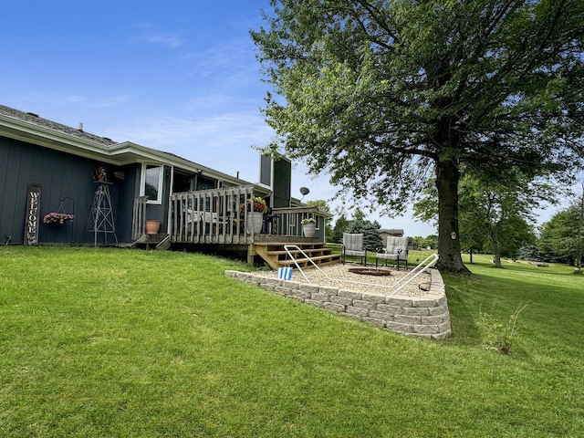 view of yard featuring a deck