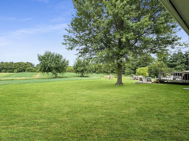 view of yard with a deck