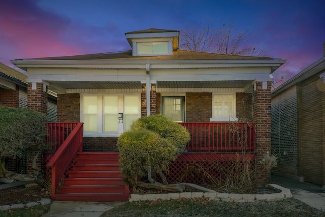 view of front facade featuring covered porch