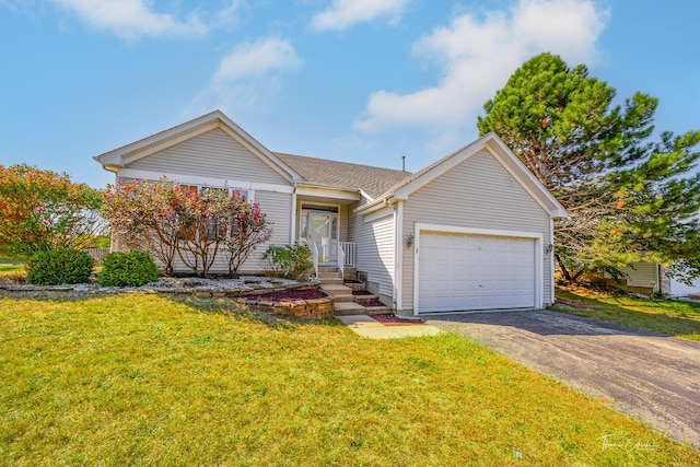 ranch-style house with a garage and a front lawn