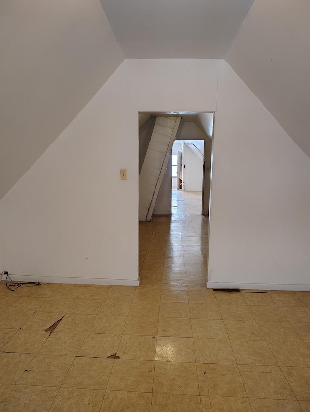 bonus room featuring lofted ceiling