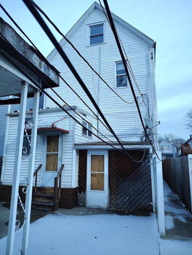 view of snow covered house