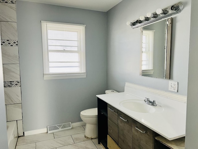 full bathroom featuring vanity, toilet, and bathing tub / shower combination