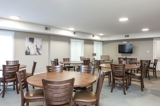 view of carpeted dining space