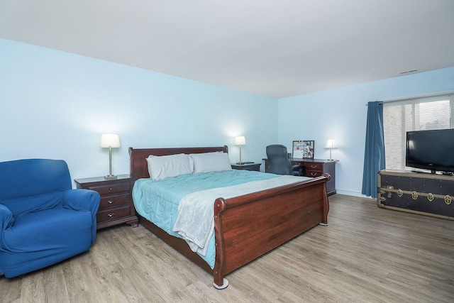 bedroom featuring light hardwood / wood-style flooring