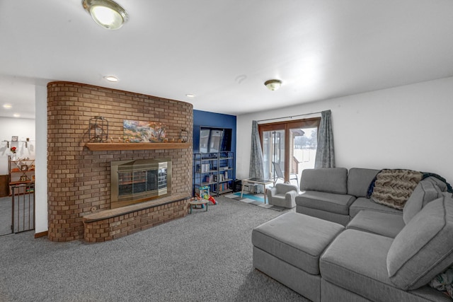 living room featuring carpet flooring and a fireplace