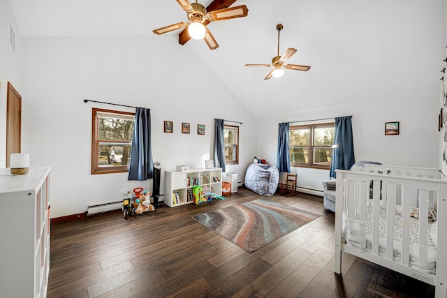 bedroom featuring ceiling fan, dark hardwood / wood-style floors, a crib, and high vaulted ceiling