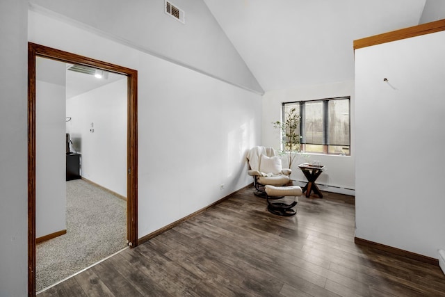 sitting room with dark wood-type flooring, high vaulted ceiling, and a baseboard radiator