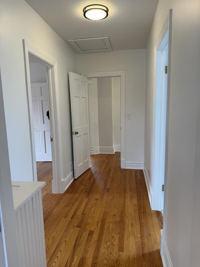 hall with light wood-type flooring