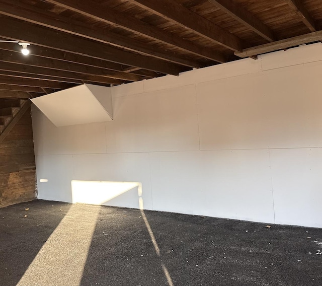 basement featuring wood ceiling