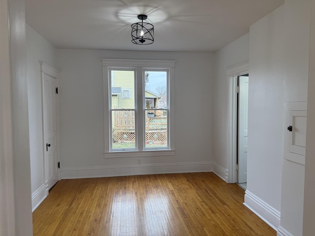 spare room featuring light hardwood / wood-style floors