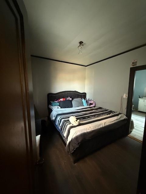 bedroom featuring hardwood / wood-style floors