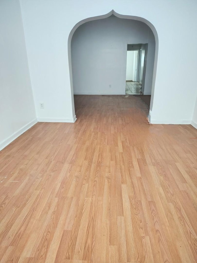 empty room with light wood-type flooring