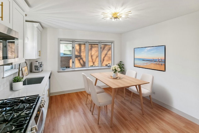 dining room featuring light hardwood / wood-style floors