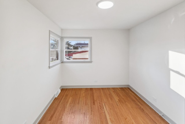 empty room with light wood-type flooring