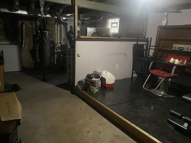 basement featuring washer / dryer and water heater