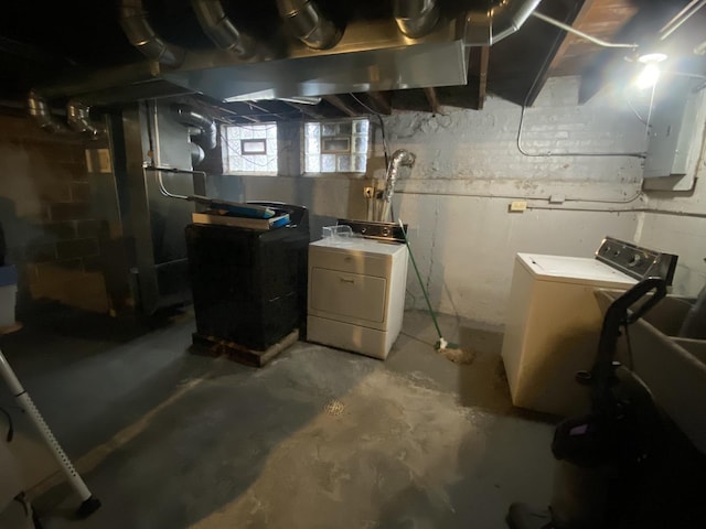 basement with independent washer and dryer and electric panel