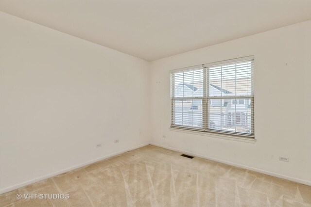 bathroom featuring walk in shower, tile patterned flooring, vanity, and toilet