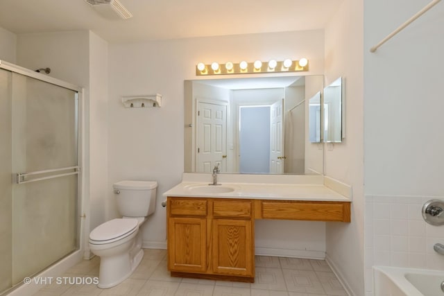 full bathroom with vanity, shower with separate bathtub, and toilet