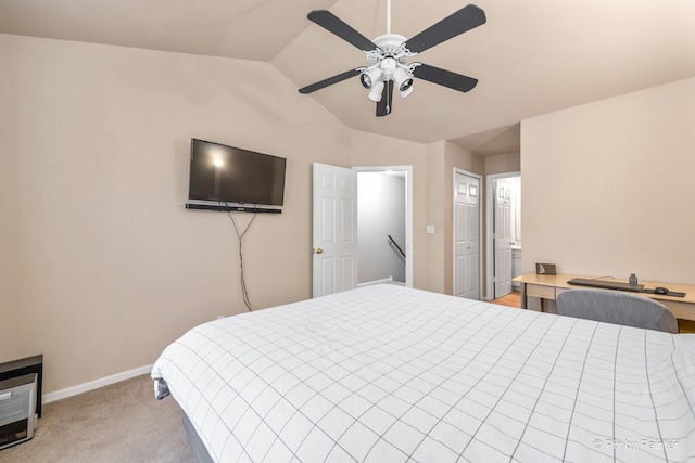 carpeted bedroom with lofted ceiling and ceiling fan