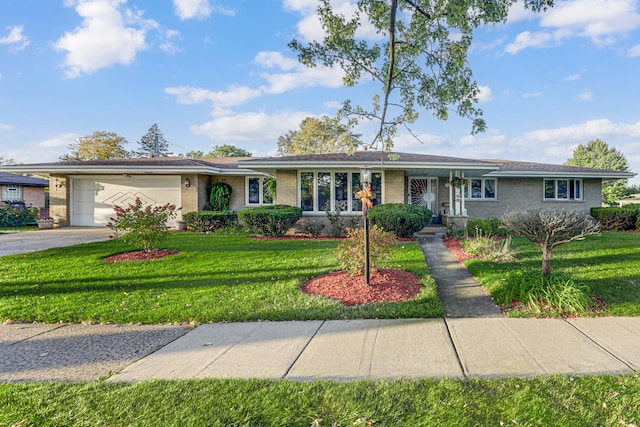 single story home featuring a front lawn and a garage