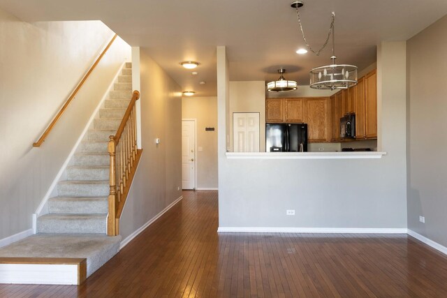 bathroom featuring hardwood / wood-style floors, vanity, and toilet