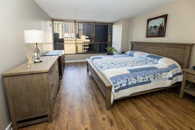 bedroom featuring dark hardwood / wood-style floors