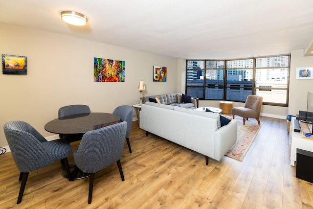 living room with light hardwood / wood-style floors