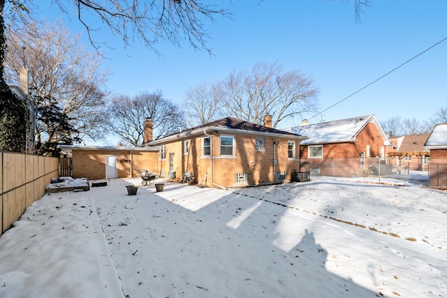 view of snow covered house