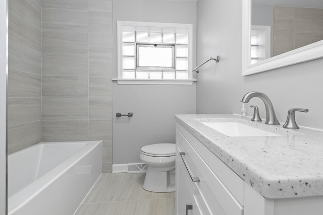 full bathroom featuring tile patterned floors, toilet, tub / shower combination, and vanity