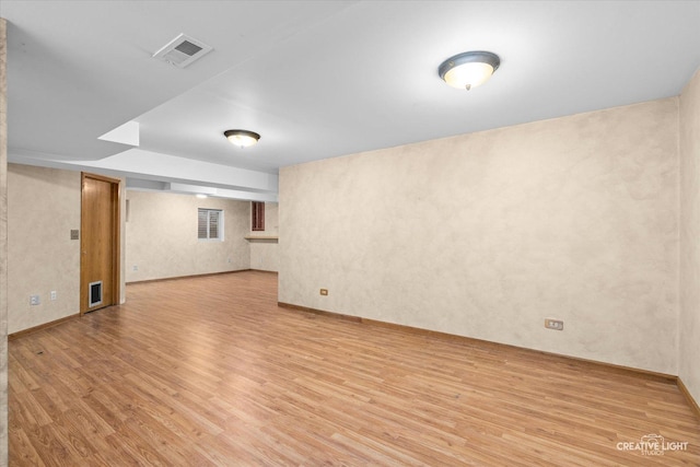 basement featuring light wood-type flooring