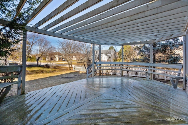 wooden deck featuring a pergola